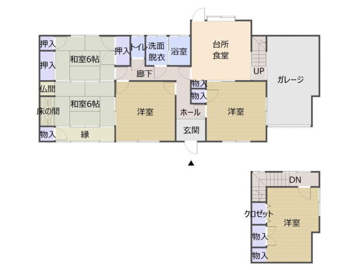 6帖和室が2部屋、台所兼食堂、洋室が3部屋、浴室、ガレージなどの位置を示した間取り図